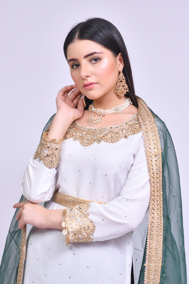 Pakistani girl in White and green dress