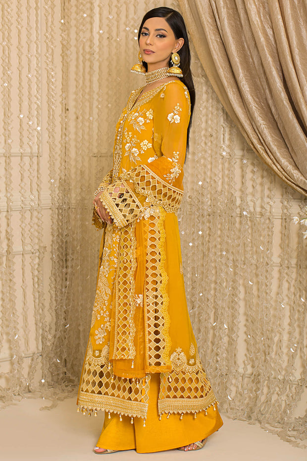 Latest Festive Pakistani Party Dress in Embroidered Yellow Kameez Trousers and Net Dupatta Style