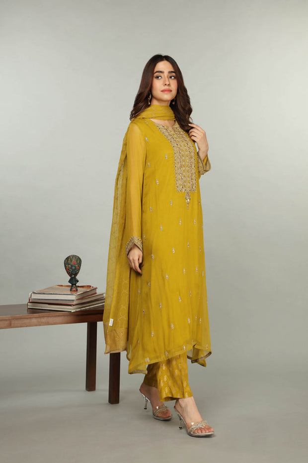 Latest Pakistani Party Dress in Lemon Colored Salwar Kameez