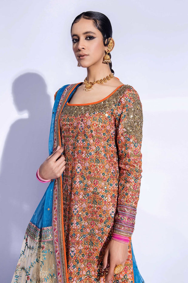 Latest Pakistani Wedding Dress in Long Kameez Churidar Style