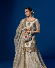 Latest Pakistani Wedding Dress in White Kameez Gharara Style