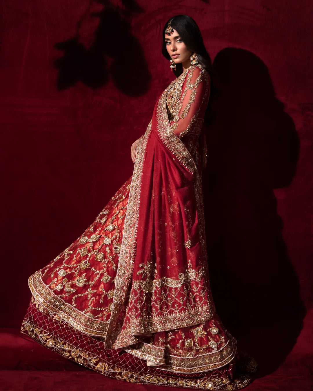 Stunning Red Pakistani Bridal Dress in Peplum Lehenga