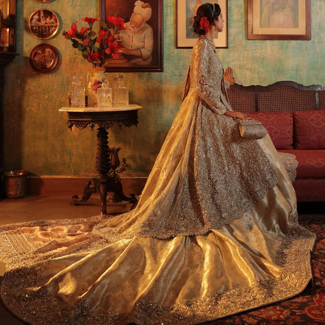 Elegantly Embellished Long Tail Bridal Lehenga Gown