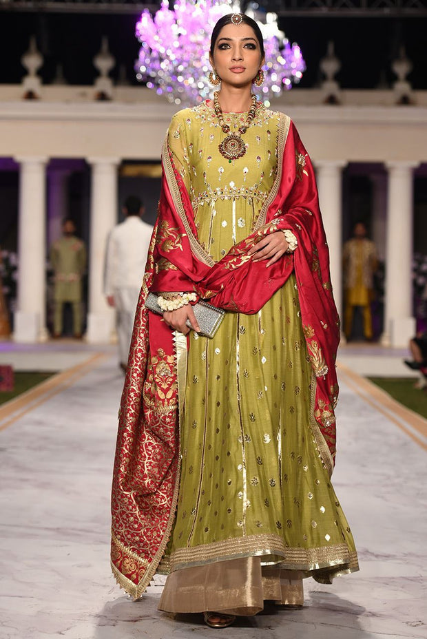 Beautiful designer bridal mehendi dress embroidered in green color