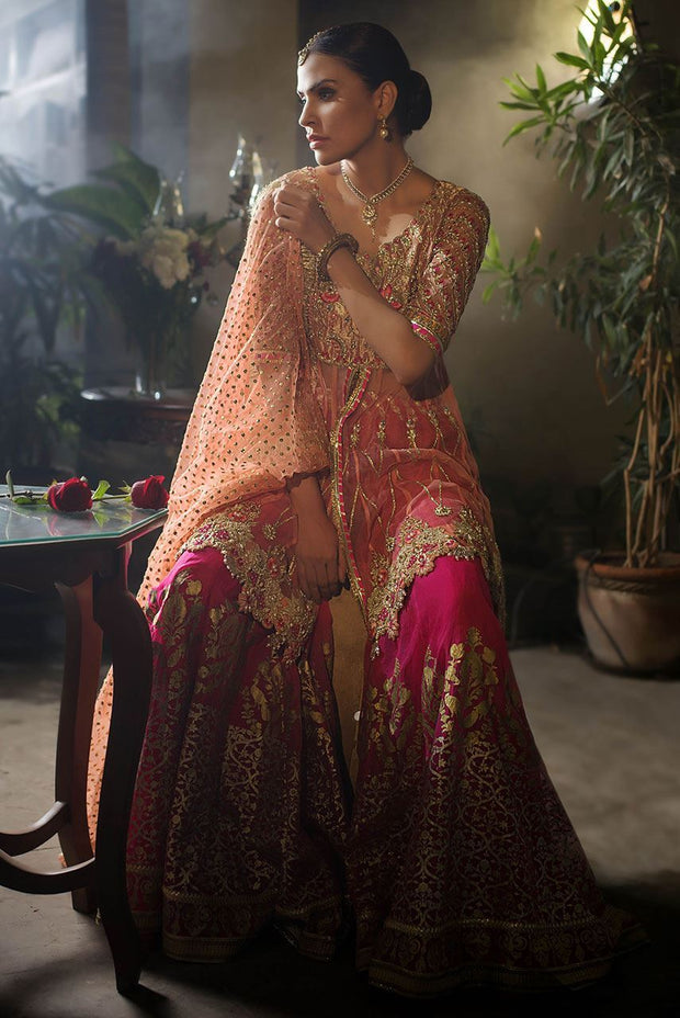 Beautiful designer mehndi dress embroidered in gold pink color