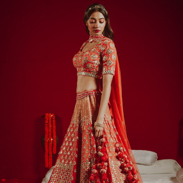 Mirror-worked Orange Lehenga Choli and Dupatta Dress