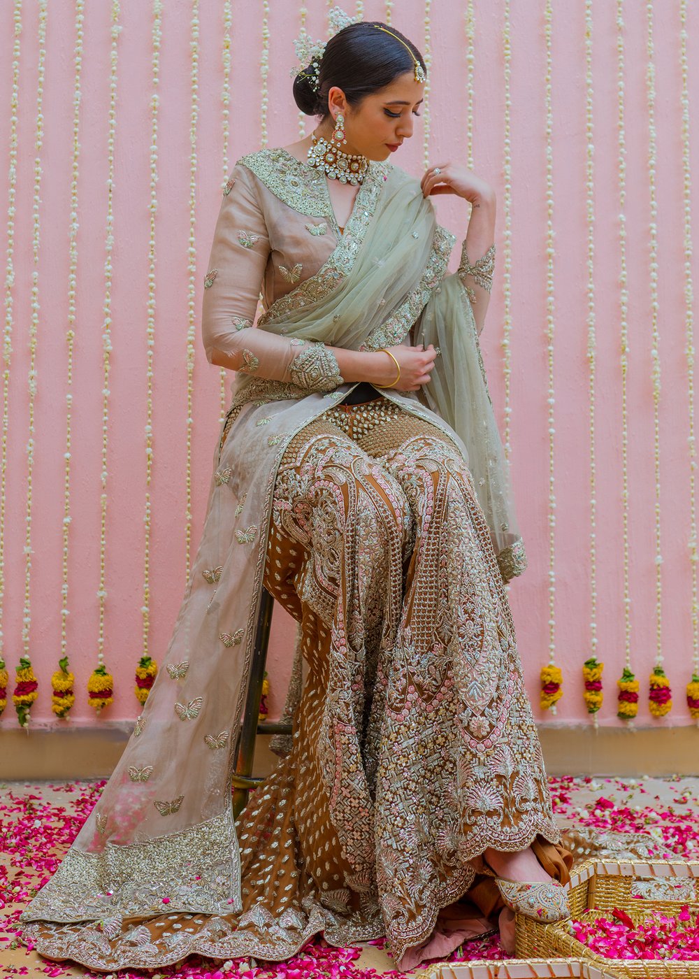 Latest net embroidered bridal outfit in rust orange color for wedding wear