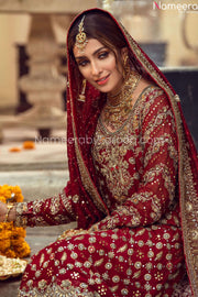 Pakistani Bridal Lehenga in Deep Maroon Color Embroidered Neckline