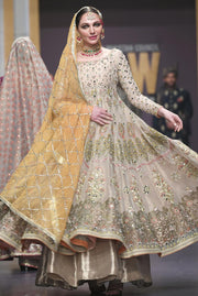 Pakistani Bridal Anarkali Froke in Gold Color for Wedding