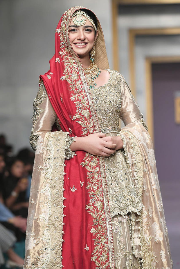 Pakistani Bridal Gold Peplum and Lehnga for Wedding Closeup