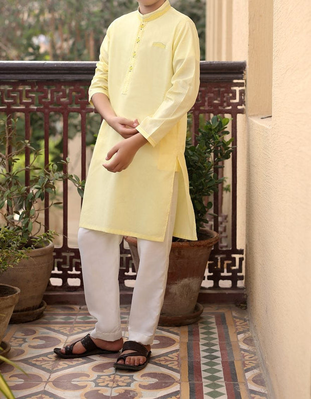 Pakistani designer boys kurta in lemon yellow color 