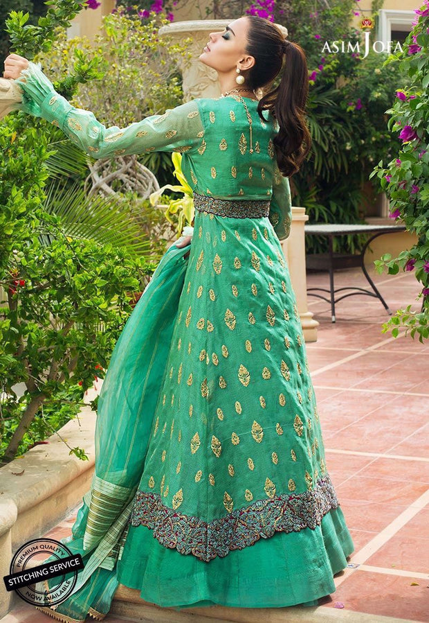 Pakistani designer dress in green color