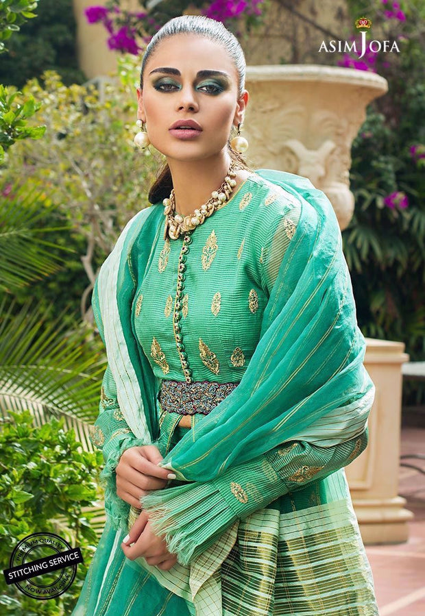 Pakistani designer dress in green color