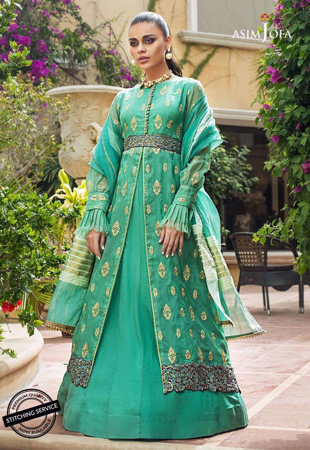 Pakistani designer dress in green color