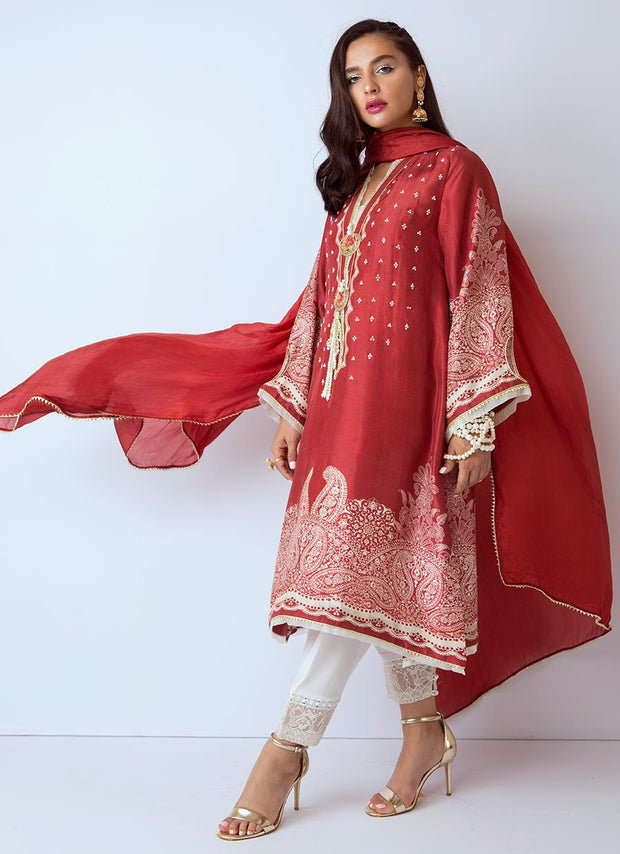 Beautiful Pakistani designer silk dress in red color 