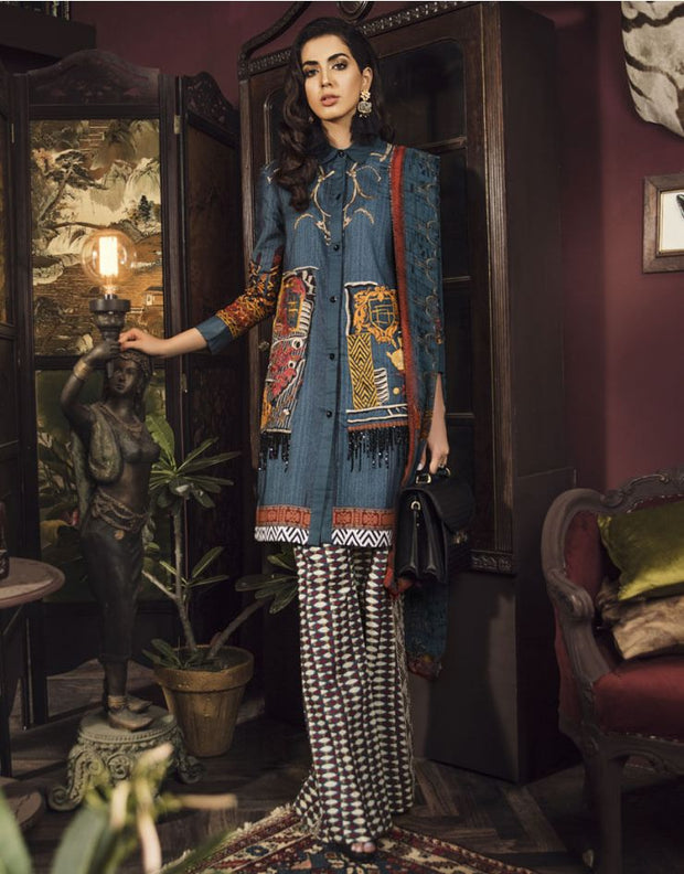 Beautiful embroidered Pakistani linen dress in blue color