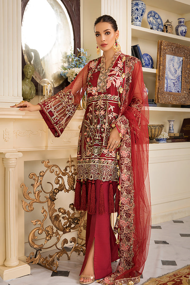 Alluring Pakistani net embroidered outfit in lavish red color 