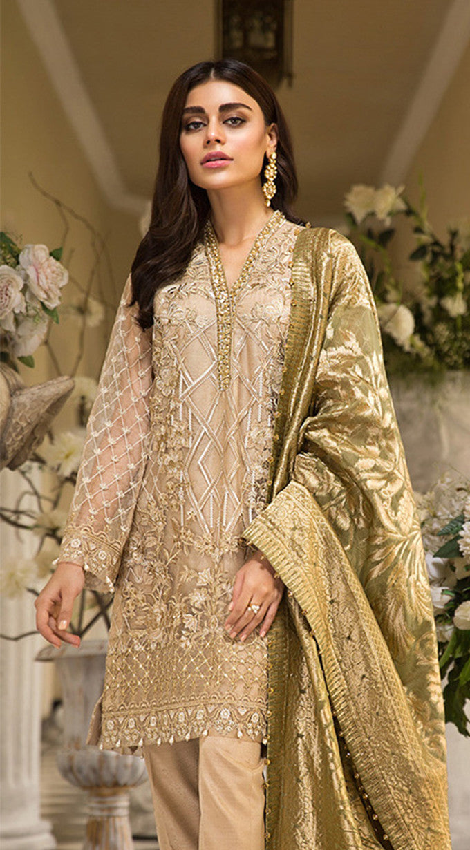 Pakistani embroidered organza dresses in skin gold color Nameera by Farooq Pakistani embroidered organza dresses in skin gold color Nameera by Farooq