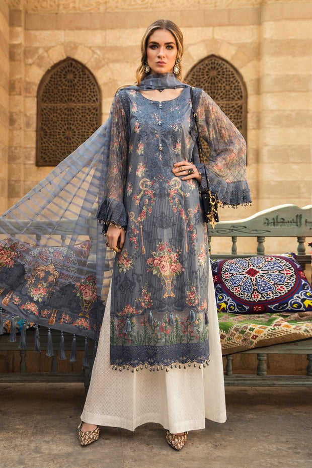 Embroidered Pakistani designer eid dress in lavish blue color