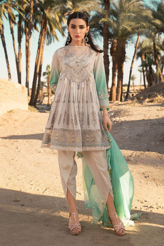 Latest Pakistani eid embroidered outfit in elegant off white color