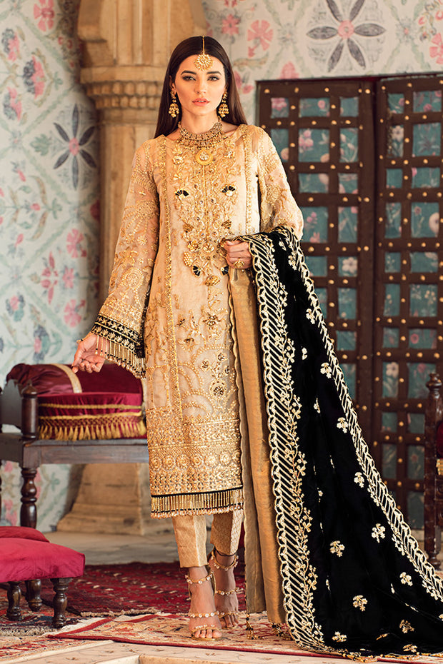 Latest designer embroidered party net outfit in gold color