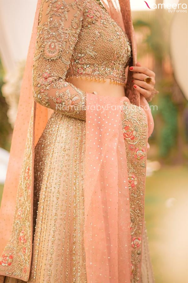 Peach and golden bridal lehenga top