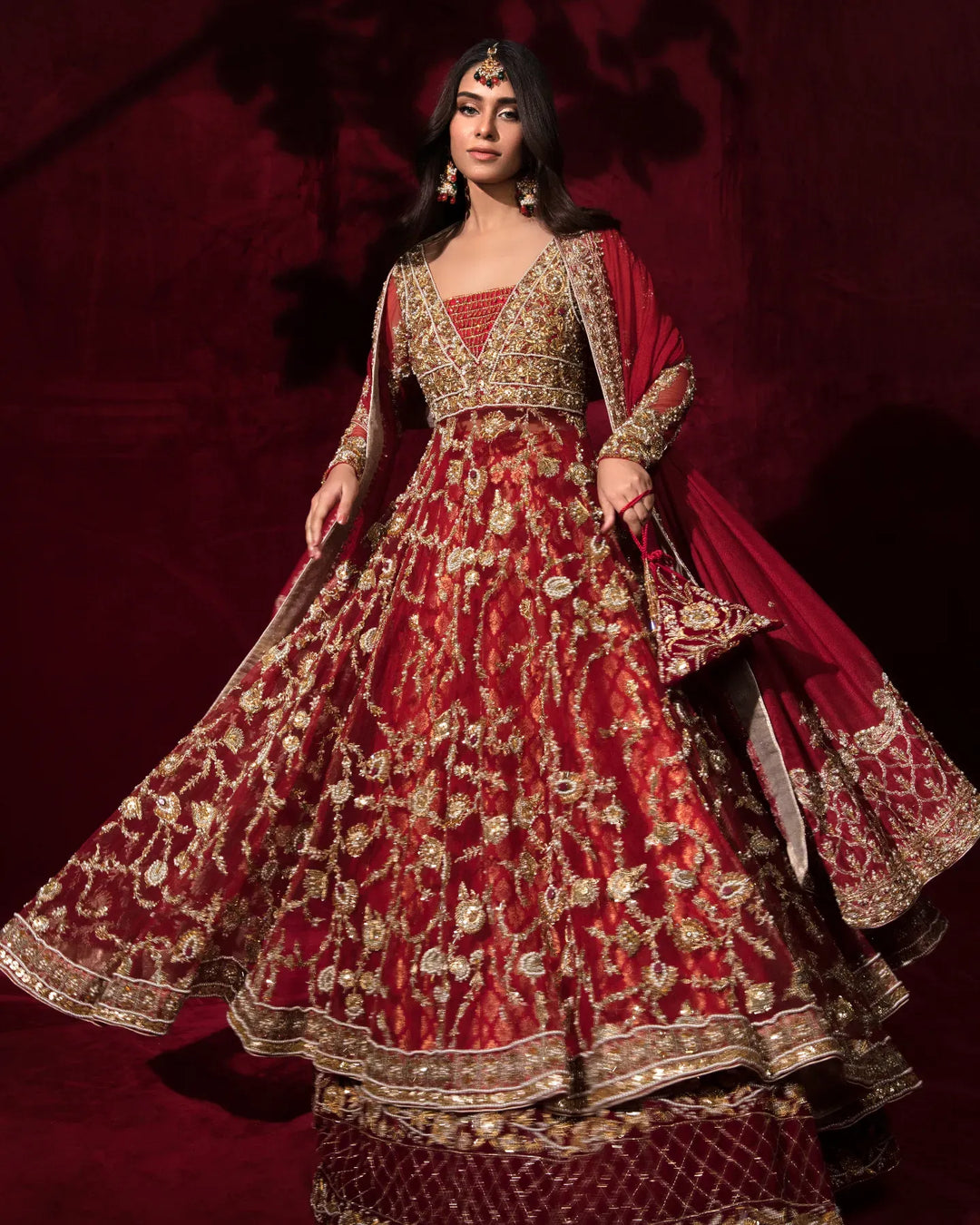 Stunning Red Pakistani Bridal Dress in Peplum Lehenga