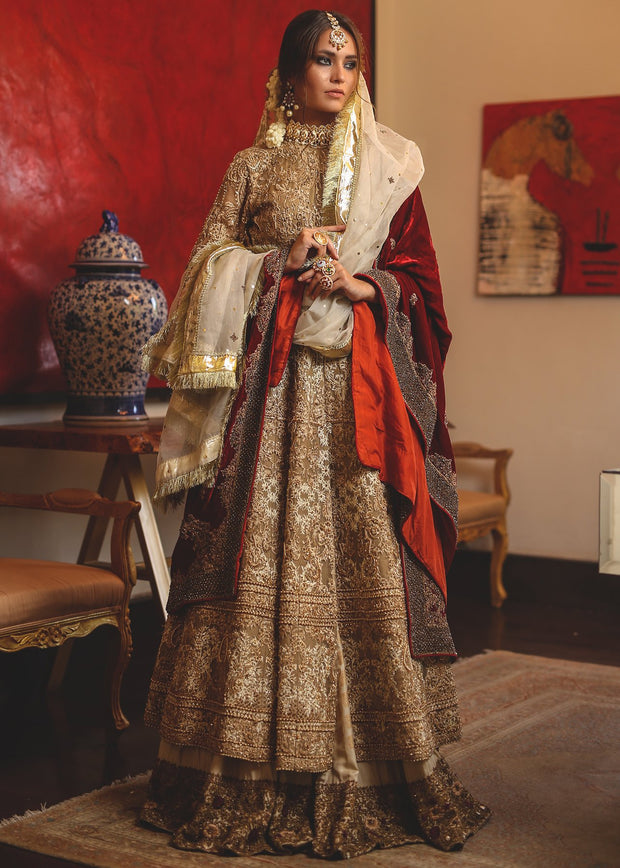 Red anarkali frock by Pakistani designer beautifully embroidered