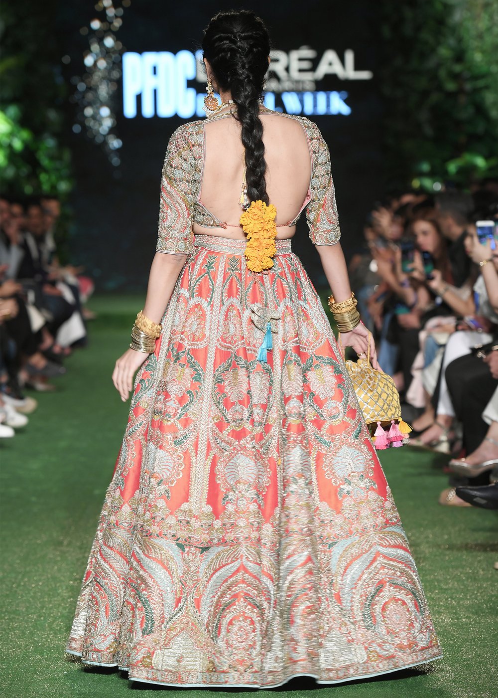 Latest silk embroidered lehnga in orange color for wedding wear # B3409