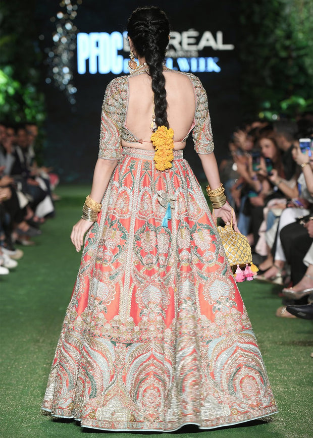 Latest silk embroidered lehnga in orange color for wedding wear # B3409