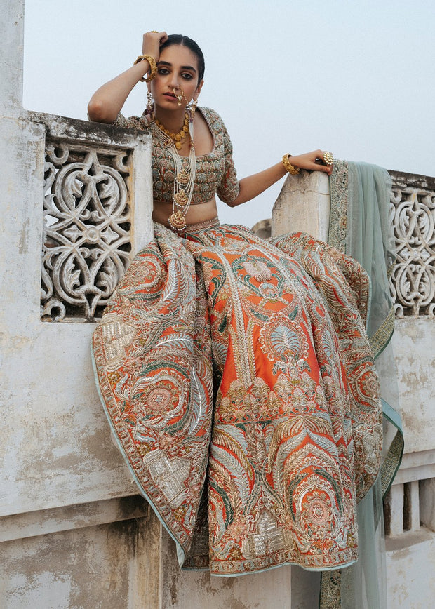 Latest silk embroidered lehnga in orange color for wedding wear # B3409