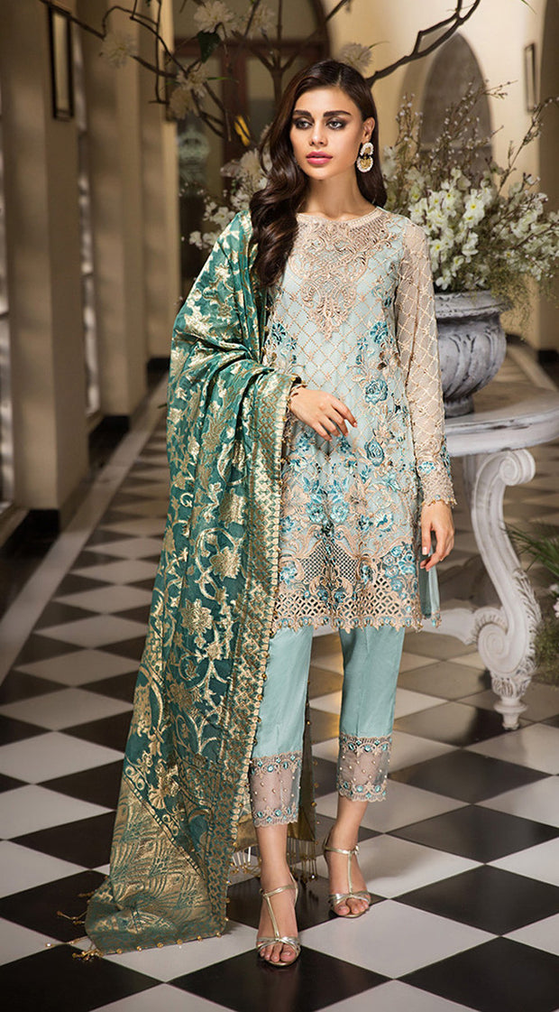 Traditional Pakistani designer dress in aqua blue color