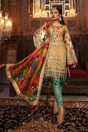 Traditional Pakistani wedding dress in shimmering gold color
