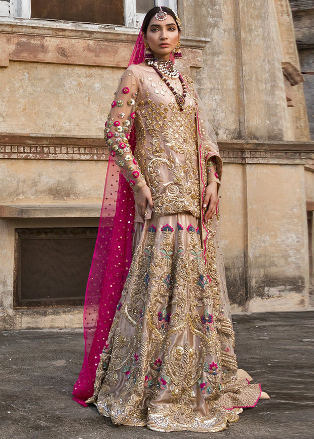 Latest bridal lehnga dress for wedding wear in pink gold color