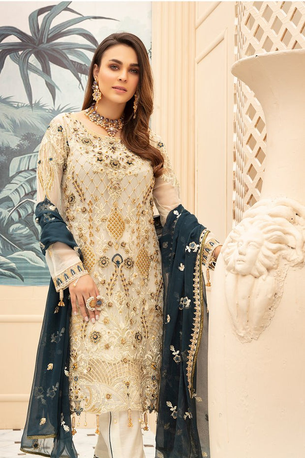 Latest embroidered Pakistani chiffon eid dress in elegant skin color