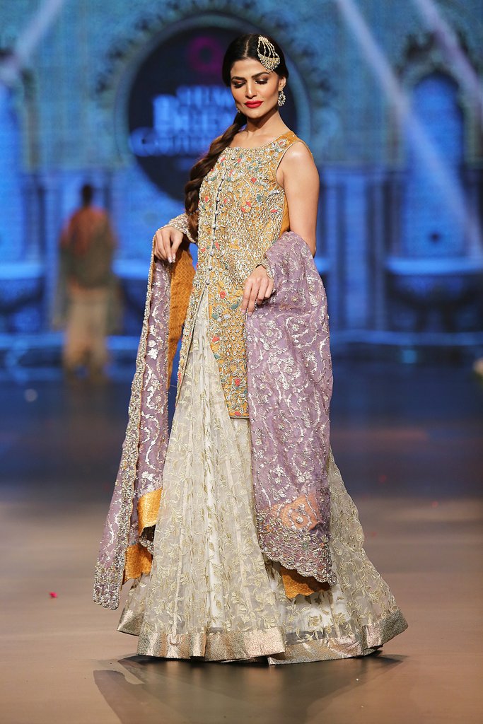 Designer embroidered lehnga dress in lilac, gold and white color # B3355