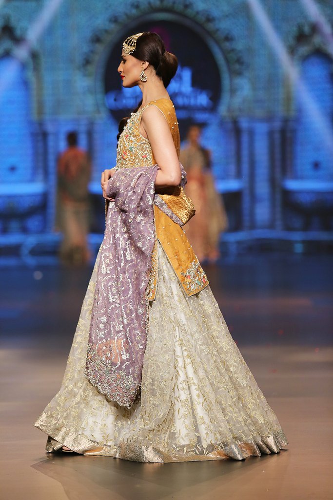 Designer embroidered lehnga dress in lilac, gold and white color # B3355