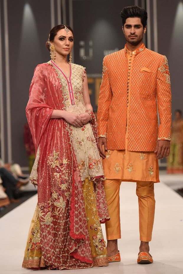 Beautiful designer mehendi dress embroidered in white and red color 