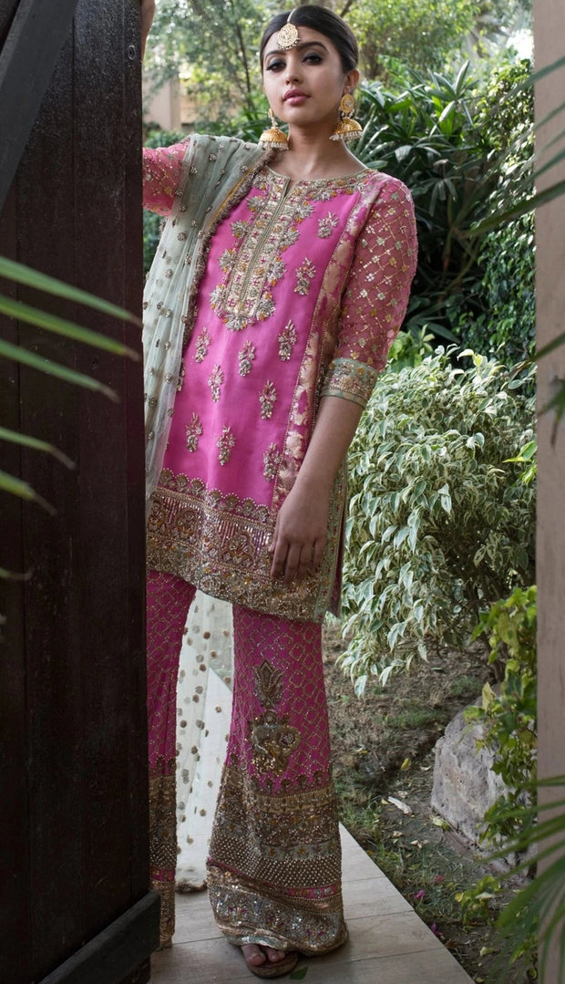 Alluring Pakistani designer party dress in lavish pink color
