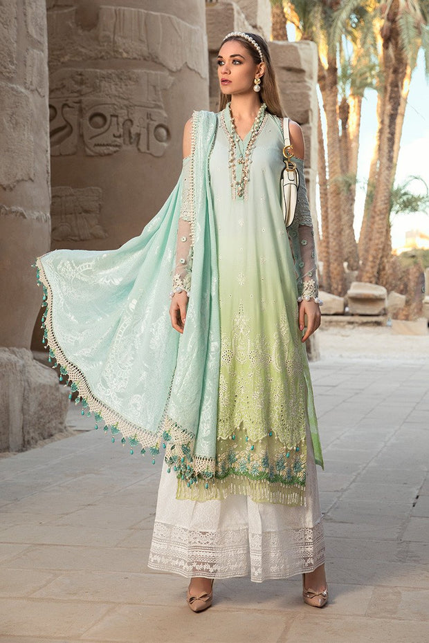 Pakistani embroidered designer eid dress in blue and green color