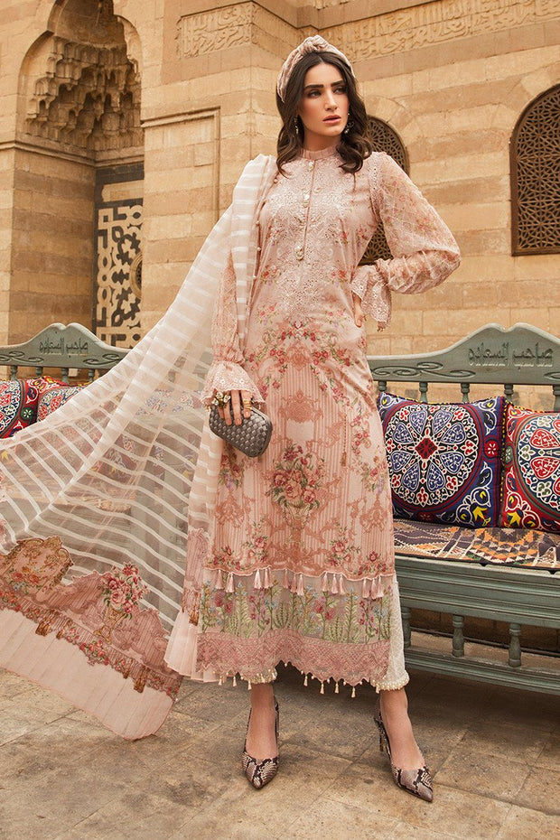 Pakistani embroidered designer eid outfit in lavish peach color 