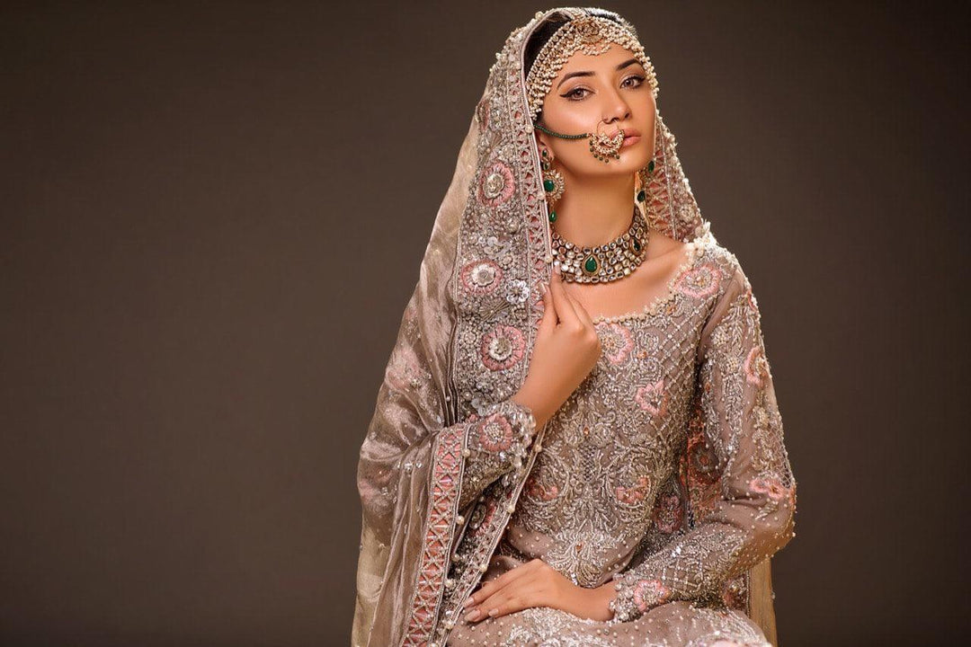 Beautiful embroidered bridal lehnga in gold and pink color # B3365