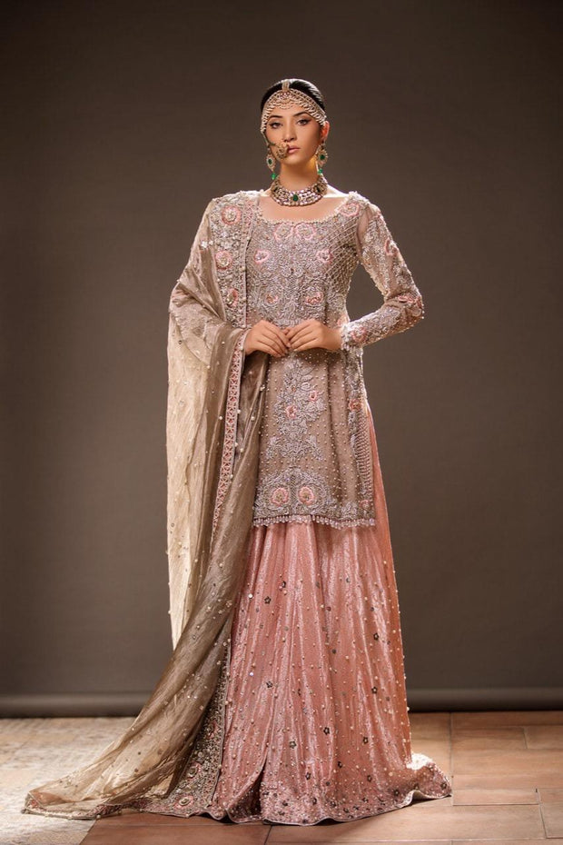 Beautiful embroidered bridal lehnga in gold and pink color 