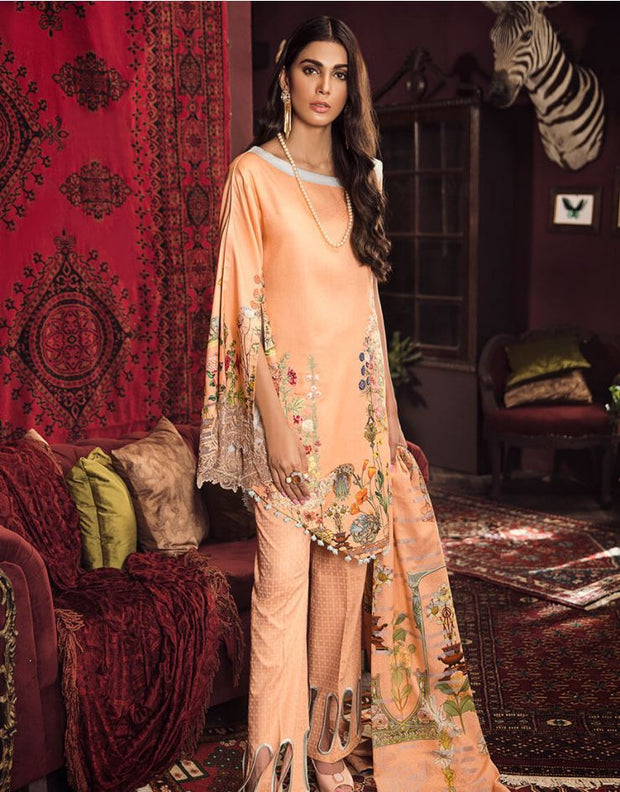 Beautiful Pakistani embroidered linen dress in peach color 