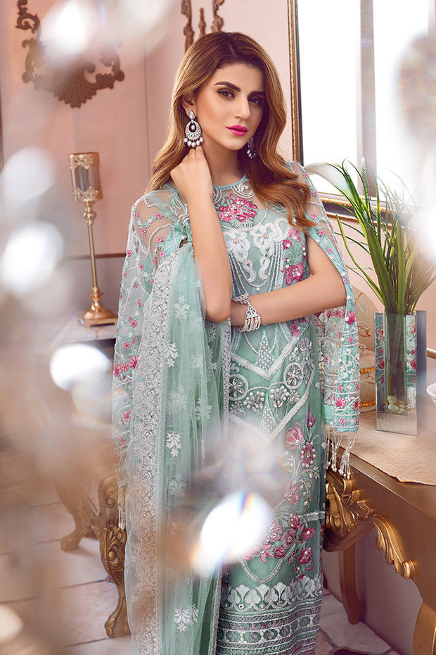 Pakistani designer embroidered net outfit in green color # P2338