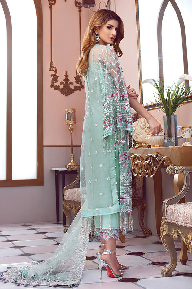 Pakistani designer embroidered net outfit in green color # P2338