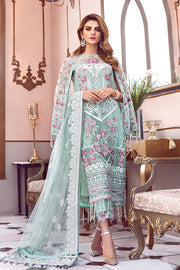 Pakistani designer embroidered net outfit in green color 