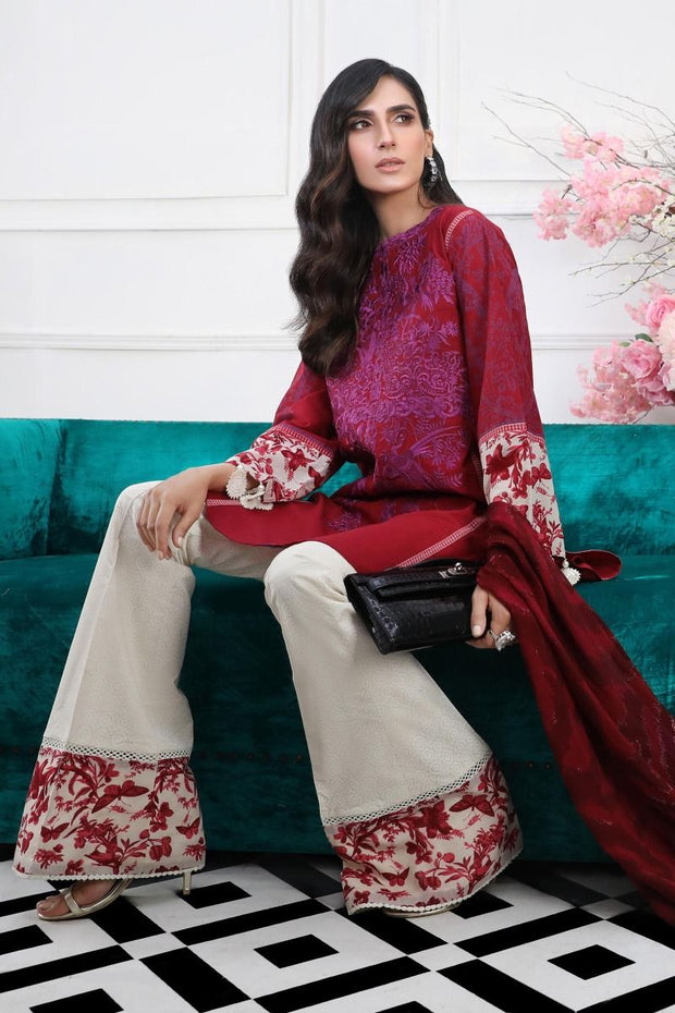 Pakistani embroidered slub dress for casual wear in red color # P2393