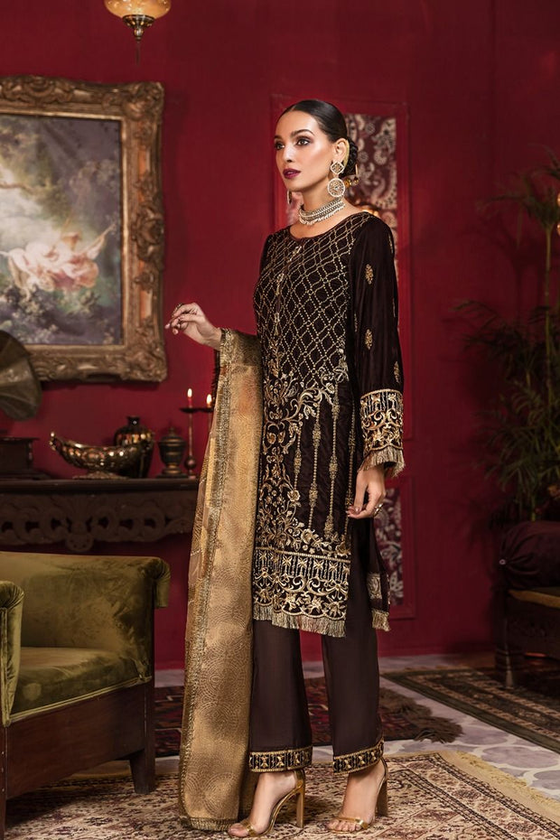 Beautiful Pakistani embroidered velvet outfit in gold brown color
