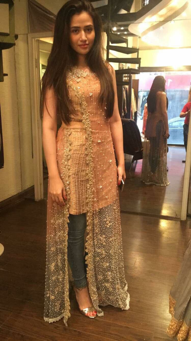 Wedding party dress in golden peach and sea green color  with pearls moti nagh and dabka work Model#B 86